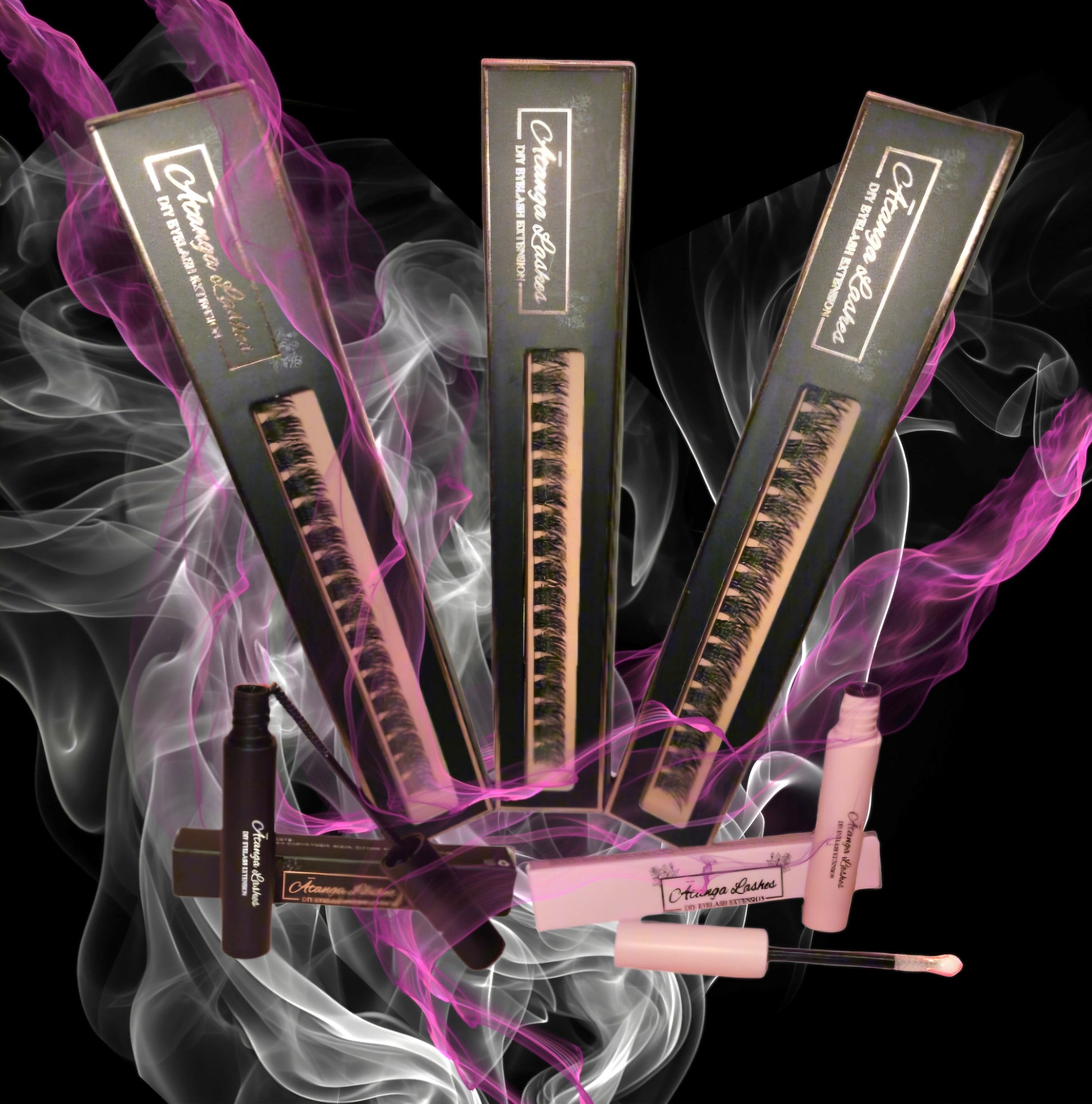 Set of false eyelashes with packaging and applicators on a black background with smoke effects.